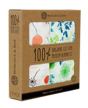 packaged organic swaddle blanket in dandelion and meadow print by Margaux & May 