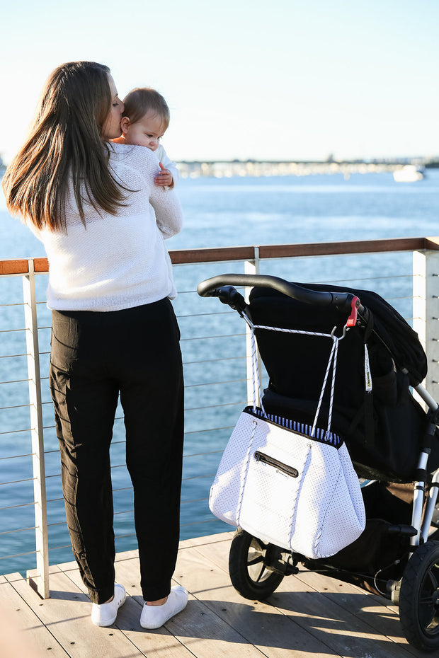 white diaper tote bag on pram 